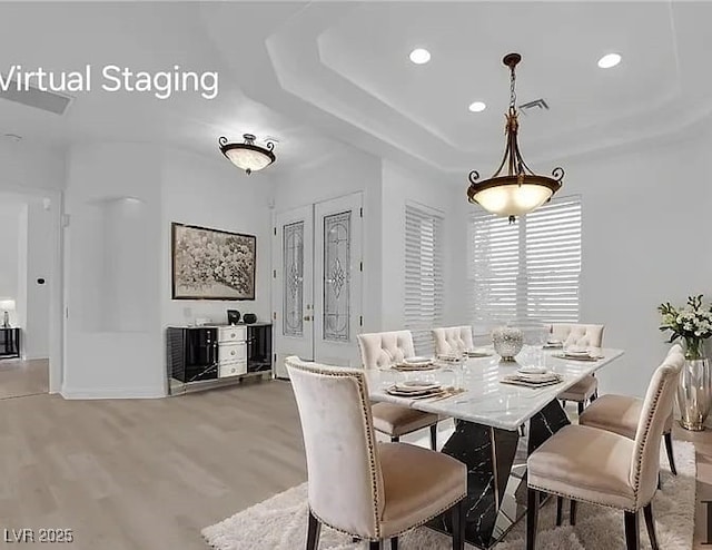 4722 Blue Mesa Way, Las Vegas, NV 89129 - dining room with light wood finished floors, recessed lighting, and a raised ceiling