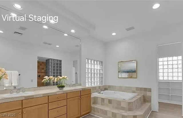 4722 Blue Mesa Way, Las Vegas, NV 89129 - full bath with double vanity, a garden tub, recessed lighting, and tile patterned floors