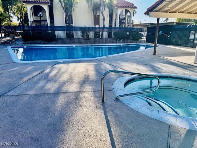 3275 Arville St Unit C, Las Vegas, NV 89102 - community pool with fence and a patio