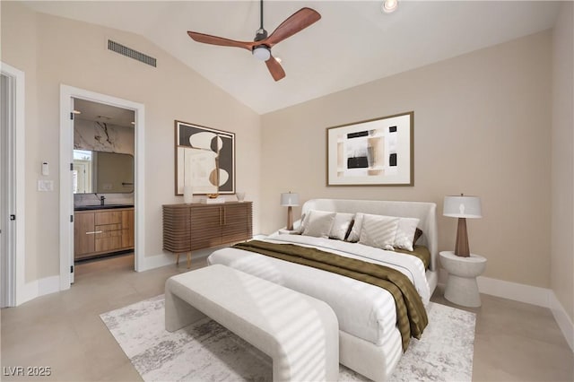 8808 Rozetta Ct, Las Vegas, NV 89134 - bedroom with vaulted ceiling, connected bathroom, baseboards, and a ceiling fan