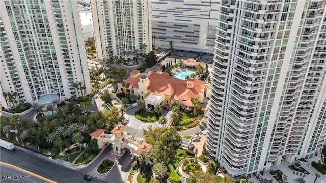 birds eye view of property featuring a city view