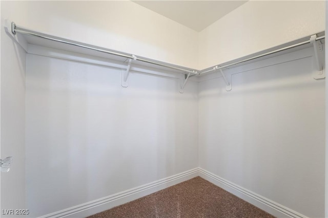 4360 Meadowlark Wing Way N, Las Vegas, NV 89084 - spacious closet featuring dark colored carpet