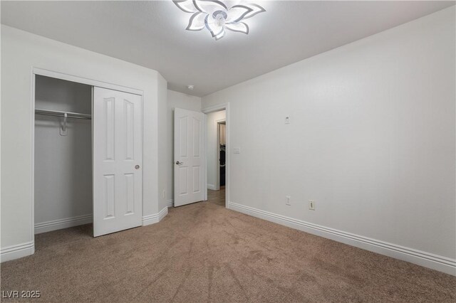 4360 Meadowlark Wing Way N, Las Vegas, NV 89084 - unfurnished bedroom featuring carpet floors, a closet, and baseboards