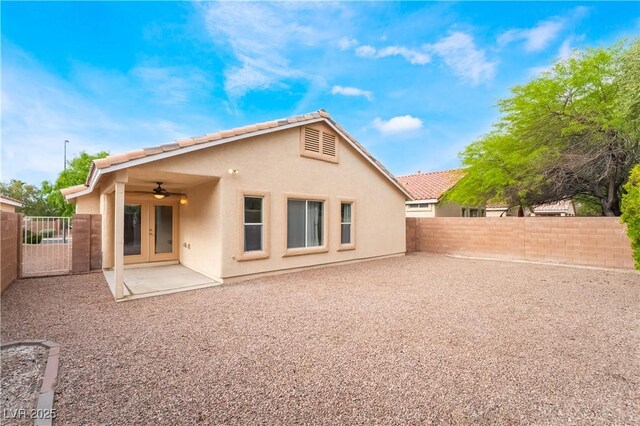 4360 Meadowlark Wing Way N, Las Vegas, NV 89084 - back of house with a ceiling fan, stucco siding, and a fenced backyard