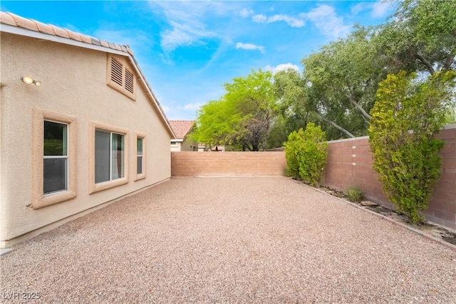 4360 Meadowlark Wing Way N, Las Vegas, NV 89084 - fenced backyard featuring a patio