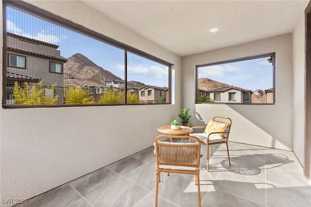 sunroom with a residential view