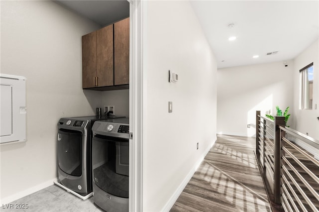 laundry room featuring recessed lighting, visible vents, baseboards, washer and dryer, and cabinet space