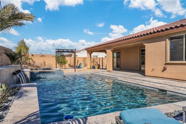 view of swimming pool featuring a fenced backyard, a patio, and a pool with connected hot tub