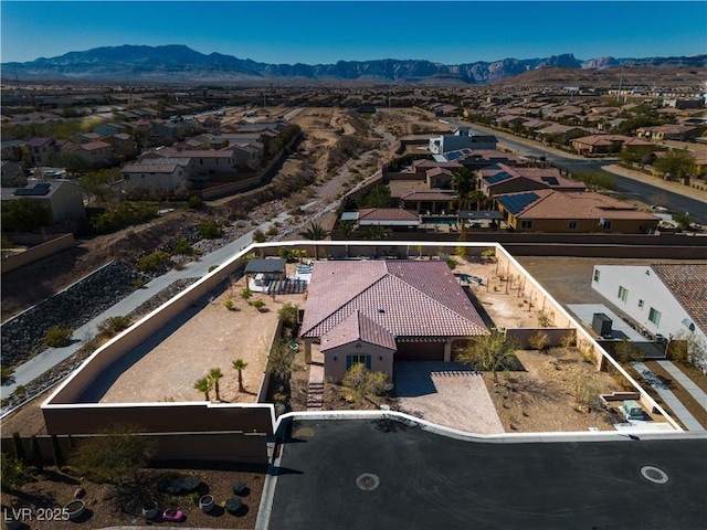 aerial view of residential area with mountains and property parcel outlined