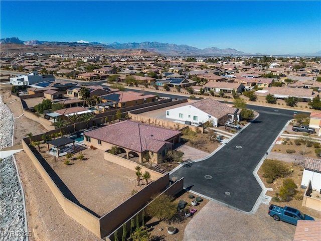 aerial view of residential area with a mountain backdrop