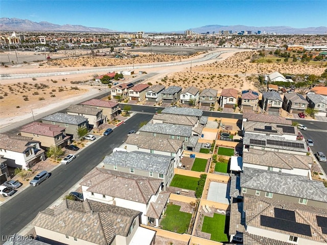 aerial view with a residential view and a mountain view