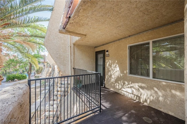 exterior space featuring a balcony
