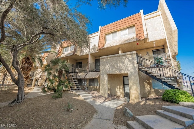 view of property with stairway