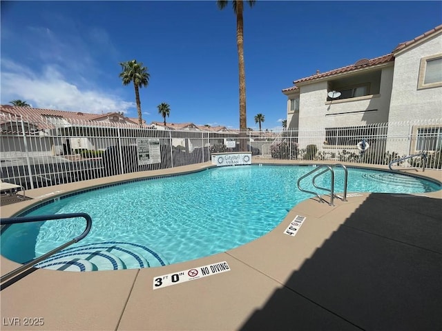 855 N Stephanie St Unit 112, Henderson, NV 89014 - community pool featuring fence and a residential view