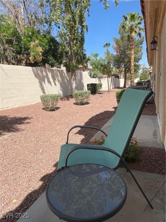 855 N Stephanie St Unit 112, Henderson, NV 89014 - view of patio featuring a fenced backyard