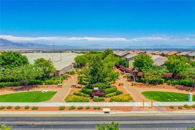 birds eye view of property featuring a mountain view