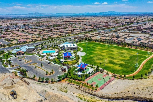 drone / aerial view with a residential view and a mountain view