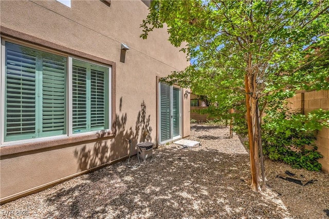 exterior space with a fenced backyard