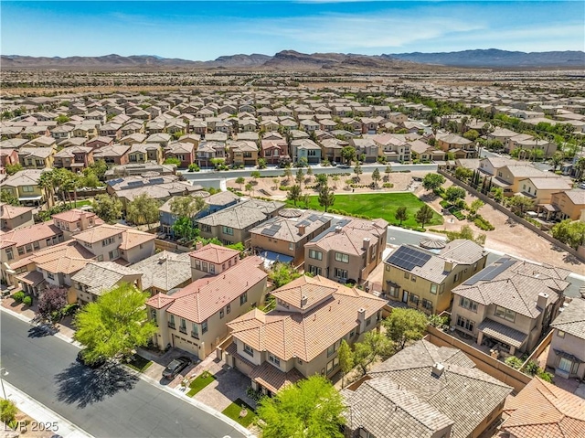 aerial view featuring a mountain view and a residential view