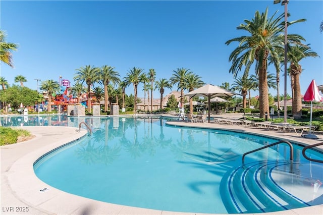 community pool featuring a patio area