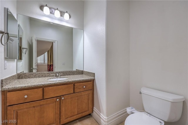 half bath with toilet and vanity