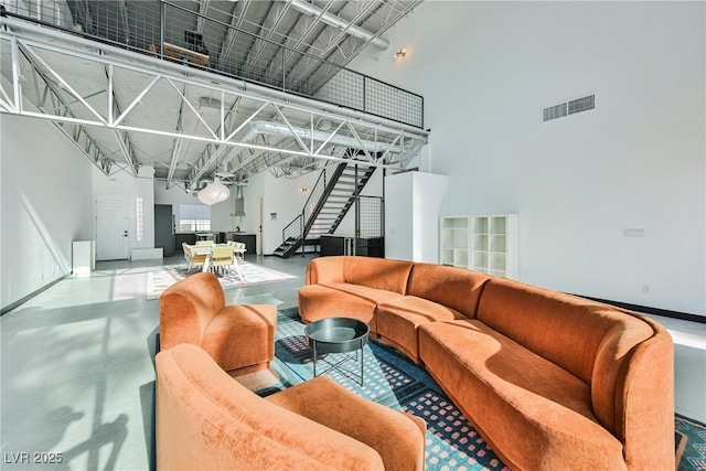 community lobby featuring visible vents and stairs