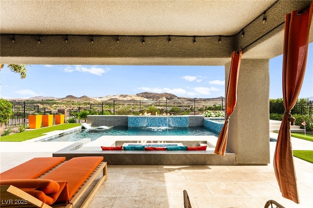 103 Reflection Cove Dr, Henderson, NV 89011 - view of pool with a mountain view, fence, and a patio area