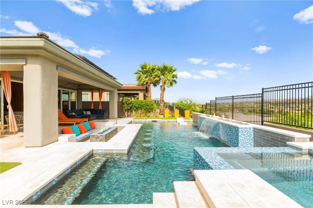 103 Reflection Cove Dr, Henderson, NV 89011 - view of pool featuring a fenced backyard, an outdoor living space with a fire pit, a patio, and a pool with connected hot tub