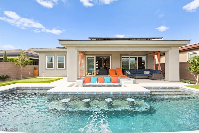 103 Reflection Cove Dr, Henderson, NV 89011 - back of property with an outdoor living space, a fenced in pool, fence, and stucco siding