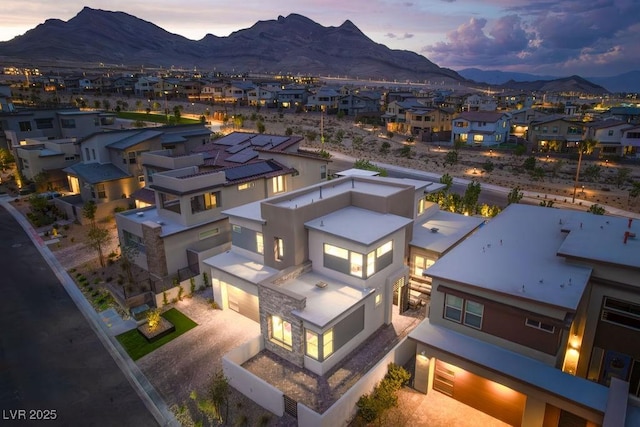 birds eye view of property featuring a residential view and a mountain view