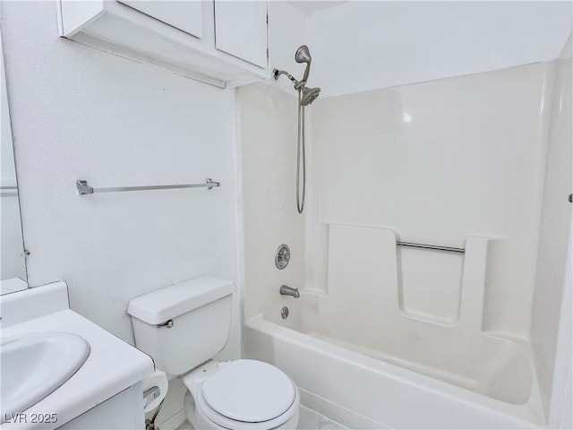 full bathroom with toilet, vanity, and tub / shower combination