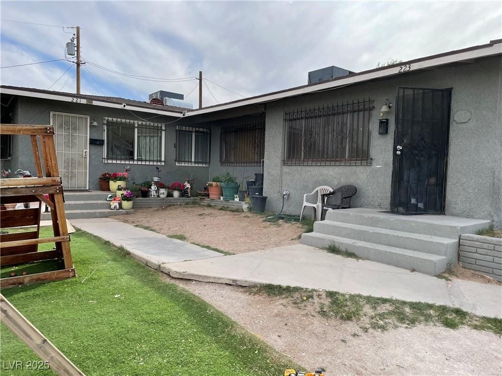 exterior space with stucco siding