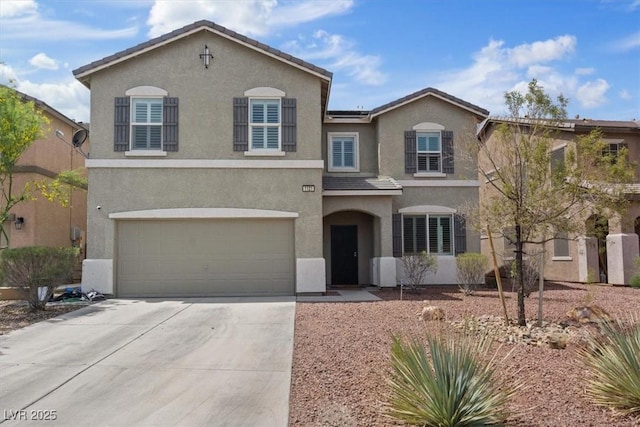 1121 Copper Grass St, Henderson, NV 89011 - traditional-style home with stucco siding, concrete driveway, a tiled roof, and a garage