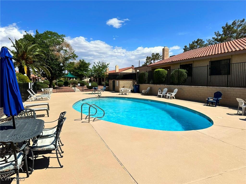 1868 Arbol Verde Way, Las Vegas, NV 89119 - pool featuring fence and a patio