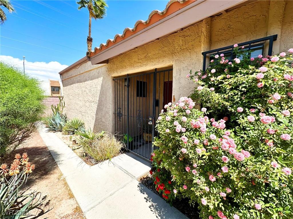 1868 Arbol Verde Way, Las Vegas, NV 89119 - entrance to property featuring stucco siding and a gate
