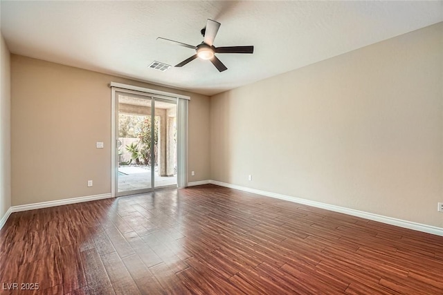 3428 Iron Hagen Ct, Las Vegas, NV 89141 - unfurnished room with baseboards, visible vents, a ceiling fan, and dark wood-style floors