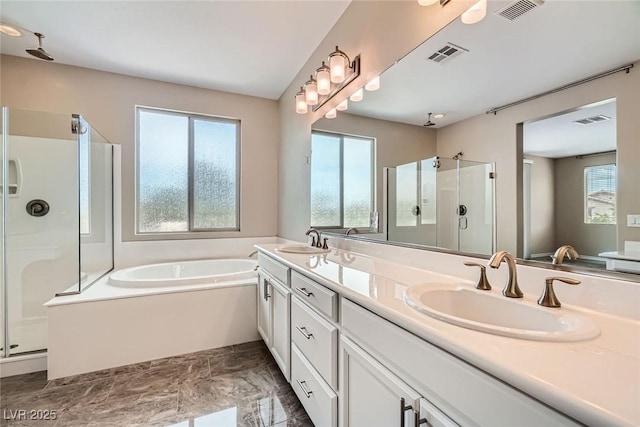 3428 Iron Hagen Ct, Las Vegas, NV 89141 - bathroom featuring a bath, visible vents, a sink, and a shower stall