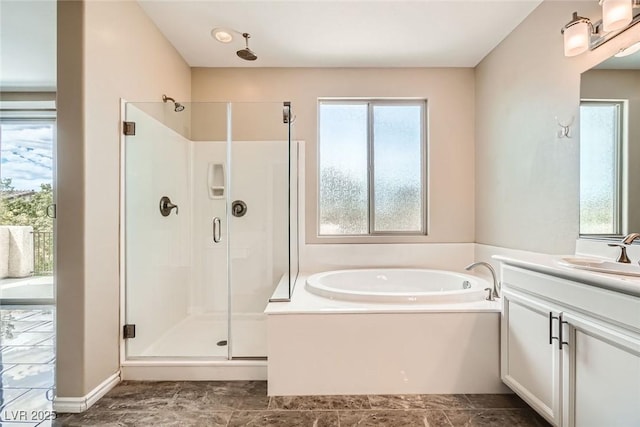3428 Iron Hagen Ct, Las Vegas, NV 89141 - bathroom featuring a bath, vanity, and a shower stall