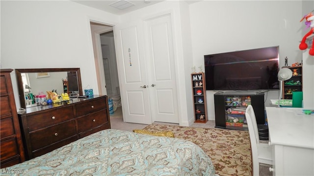 carpeted bedroom with visible vents