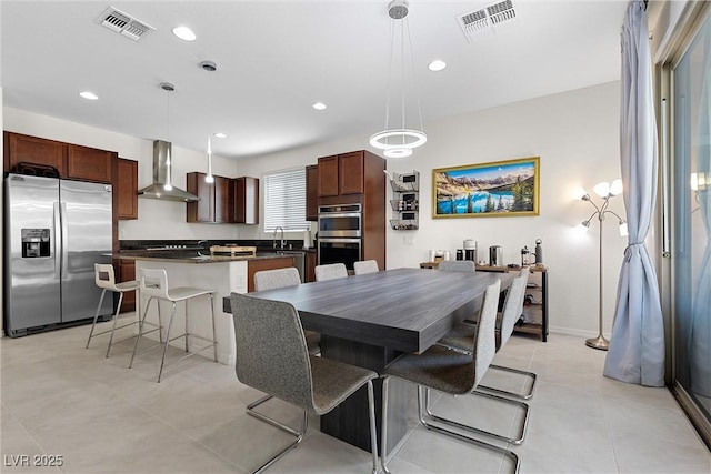 8107 Skye Sweep St, Las Vegas, NV 89166 - dining area with visible vents, light tile patterned flooring, and recessed lighting