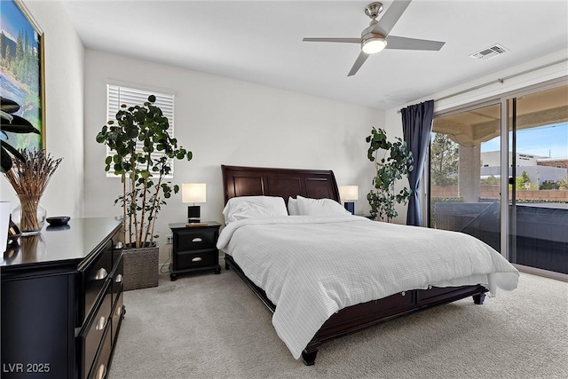 8107 Skye Sweep St, Las Vegas, NV 89166 - bedroom with visible vents, access to exterior, a ceiling fan, and light colored carpet