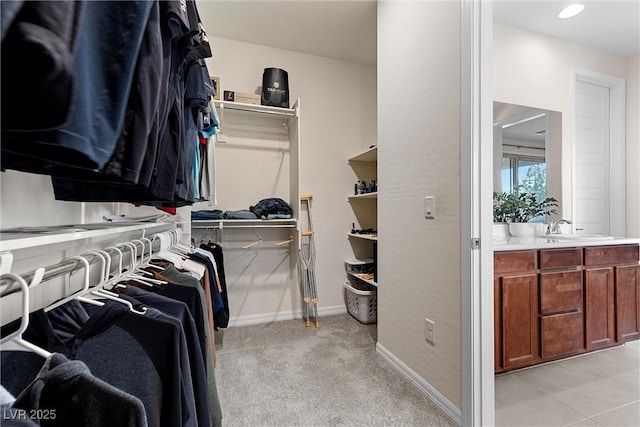 8107 Skye Sweep St, Las Vegas, NV 89166 - walk in closet with light carpet and a sink