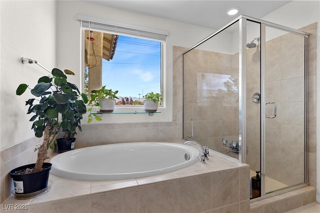 8107 Skye Sweep St, Las Vegas, NV 89166 - bathroom featuring a bath and a shower stall