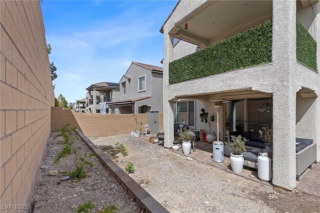8107 Skye Sweep St, Las Vegas, NV 89166 - back of house with a patio, a fenced backyard, and stucco siding