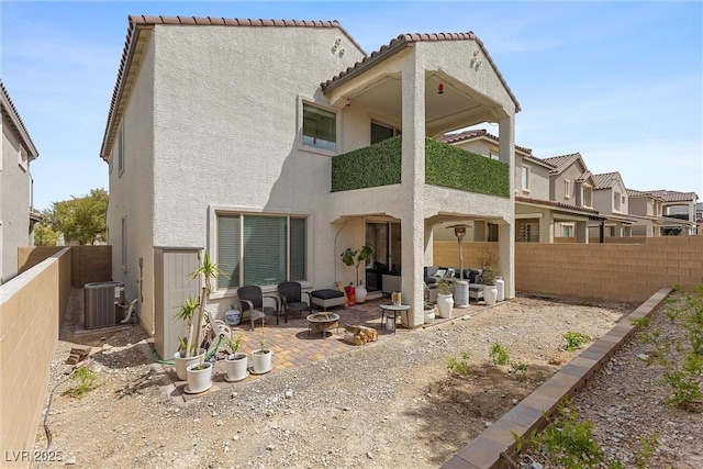 8107 Skye Sweep St, Las Vegas, NV 89166 - back of property with a patio area, central AC unit, an outdoor living space, a fenced backyard, and stucco siding