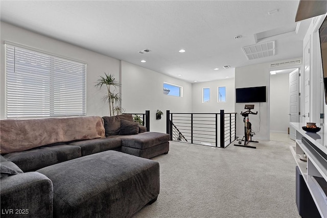 8107 Skye Sweep St, Las Vegas, NV 89166 - living area with baseboards, visible vents, light carpet, and recessed lighting