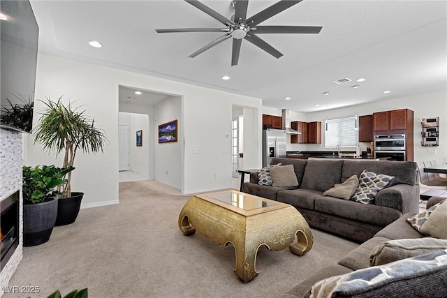 8107 Skye Sweep St, Las Vegas, NV 89166 - living room with baseboards, recessed lighting, light carpet, and ceiling fan