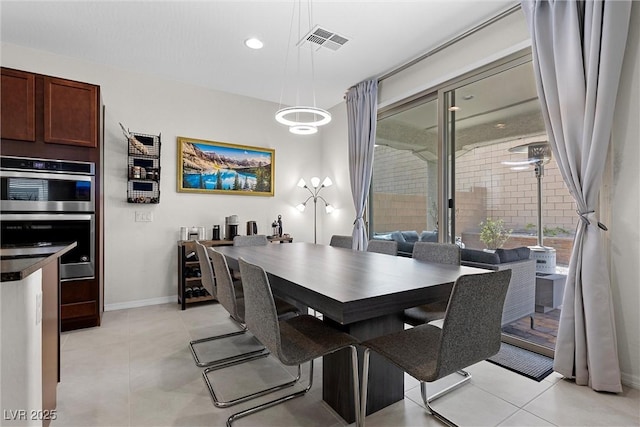 8107 Skye Sweep St, Las Vegas, NV 89166 - dining space featuring recessed lighting, light tile patterned flooring, visible vents, and baseboards