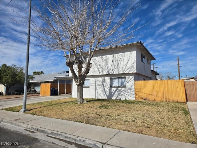 4754 Marnell Dr, Las Vegas, NV 89121 - view of front of property with a front lawn, fence, driveway, and an attached carport