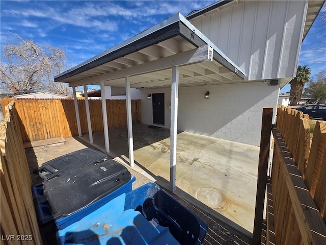 4754 Marnell Dr, Las Vegas, NV 89121 - view of patio featuring a carport and a fenced backyard
